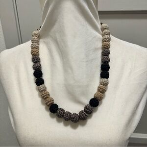 The Sak Drea Crochet Black and Tan Beaded Necklace